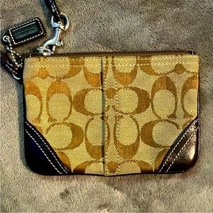 EUC Signature Coach Wristlet